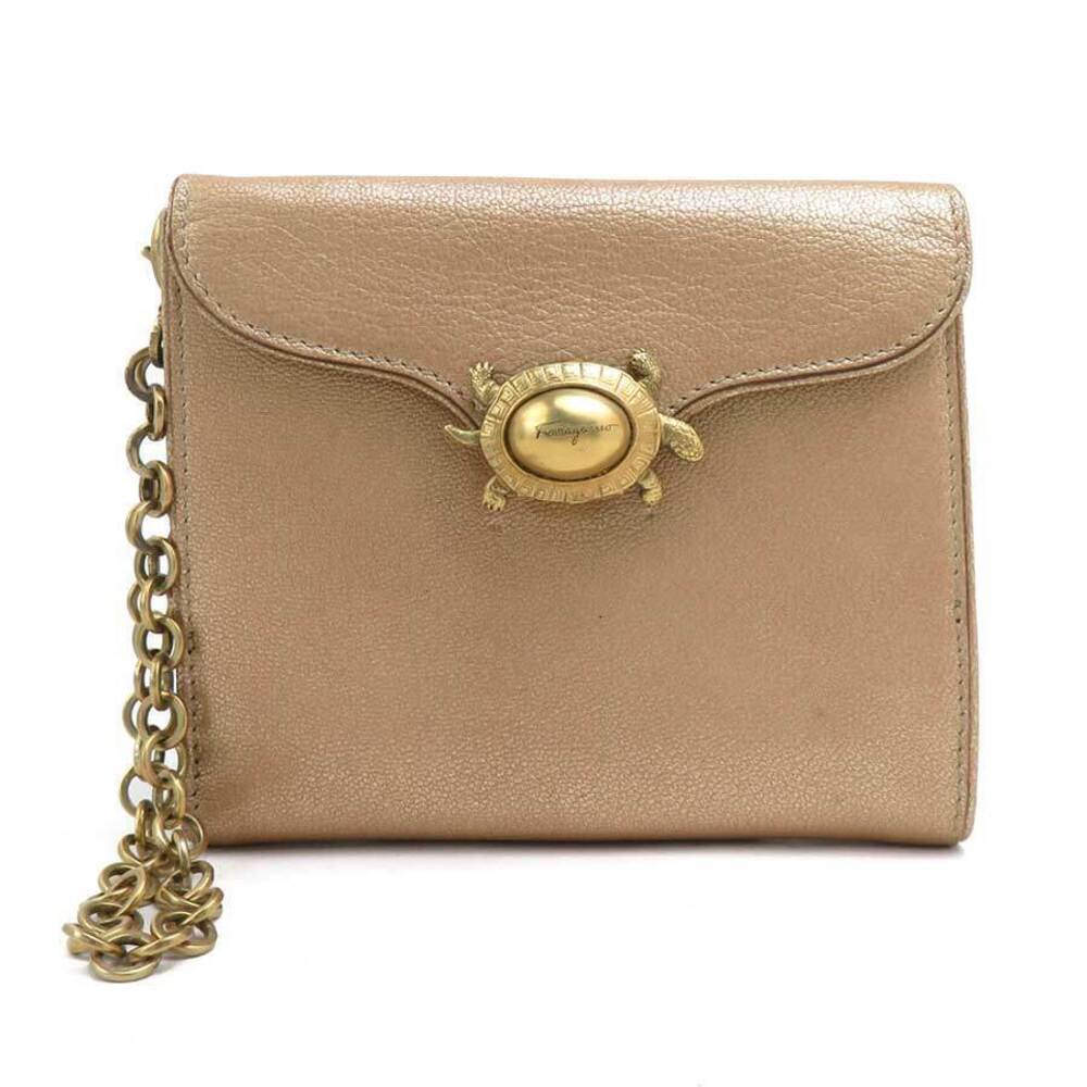 Salvatore Ferragamo bi fold wallet leather metal gold
